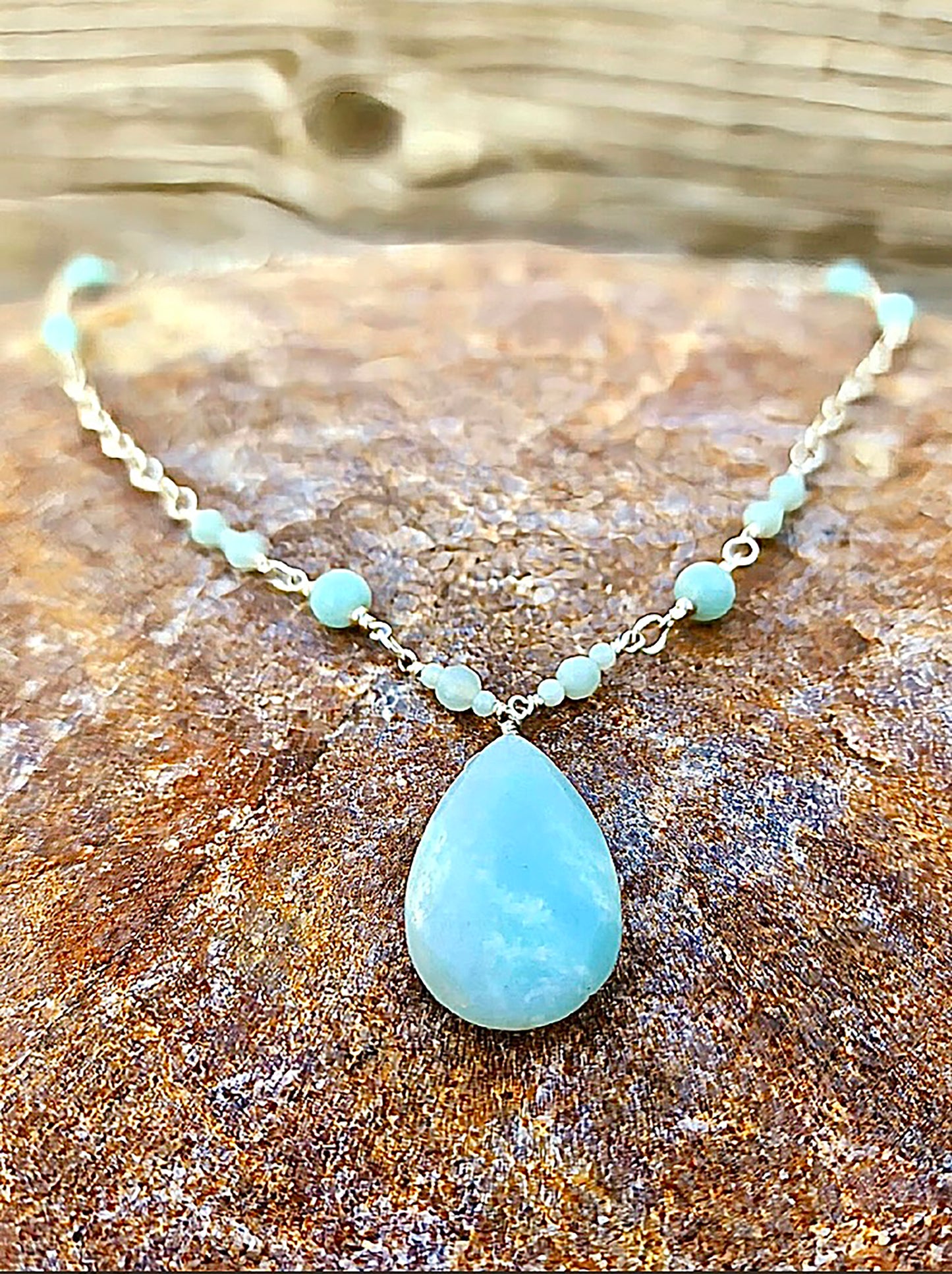 Treasured by the ancient Egyptians, Amazonite has always been prized for its beauty, healing power, and encouraging good luck and fortune.  Wire wrapped chain with amazonite beads interspersed and 1.25" drop.  Length: 20".  Available in silver or gold filled.