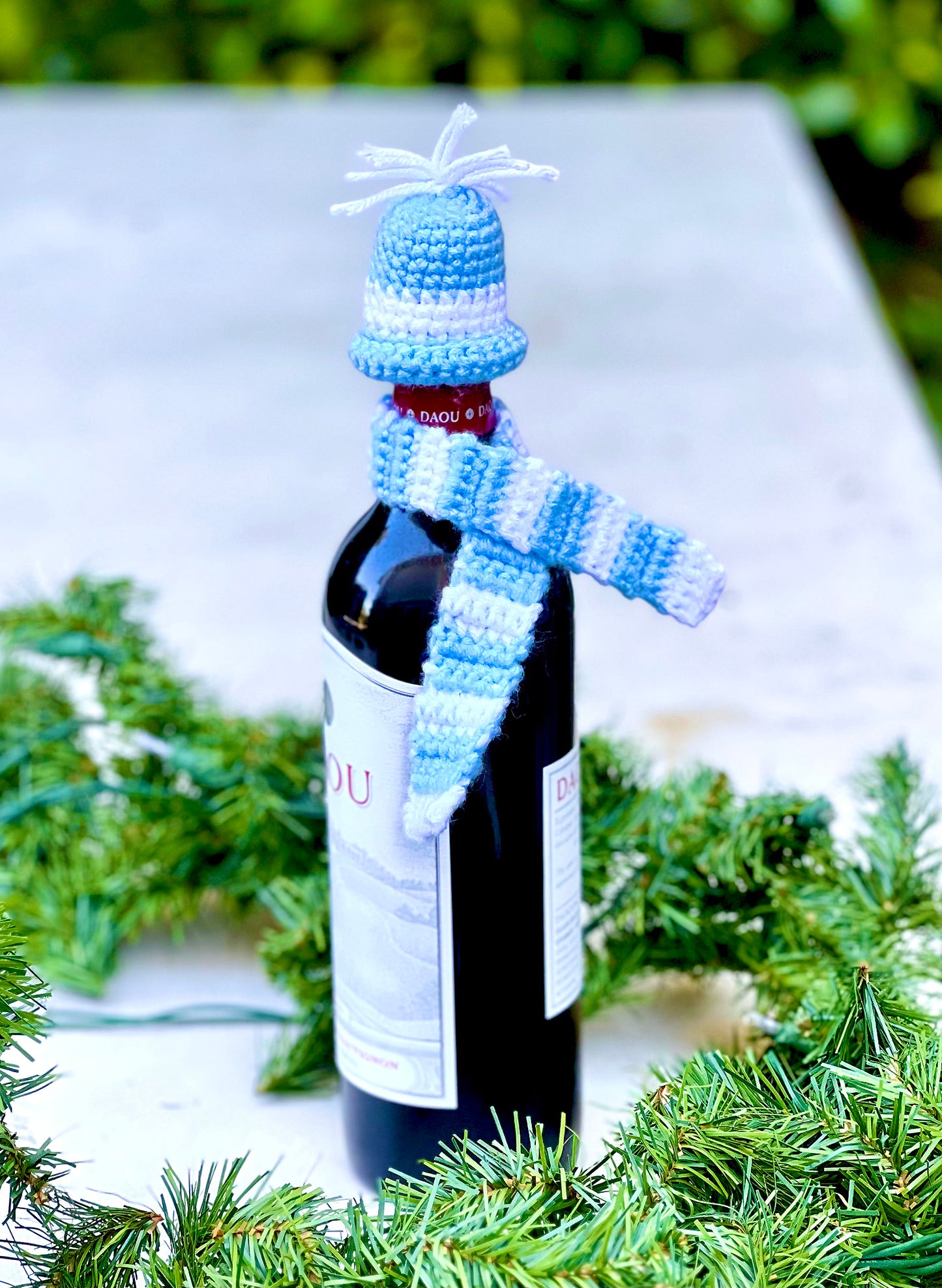 These knitted wine bottle topper hat & scarf sets make gift giving more fun. Made from upcycled acrylic yarn in three different festive styles. Made to order, please allow 3 to 7 days depending how many sets are ordered. Colors may also vary depending on availability. Acrylic yarn Hand wash cold, line dry Handmade in California