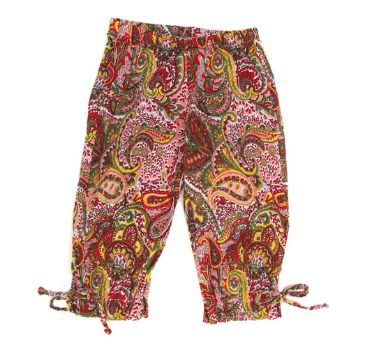 Summer colors in paisley print on soft, light weight cotton woven fabric, make these capri pants so comfortable and fun to wear in warm & tropical climates. Soft elastic waist, with ties at the ankle. Pair with the Gwyneth Halter top for a cool & comfy, summer fun look. 100% light weight cotton woven Hand wash or machine wash delicate cycle, cold. Dry low heat or Line dry. Made in the USA