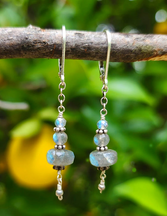 A gem of intuition, wisdom and spiritual release, Labradorite is a stone to help you breakthrough into your destiny. It's physical effects help to calm down undue stress, anxiety and blood pressure. These beautiful, single chandelier earrings are available in either gold filled or silver with lever backs. Dimensions: Length - 1 3/4" Clean with soft brush or cloth, using mild dish soap and lukewarm water Made in California