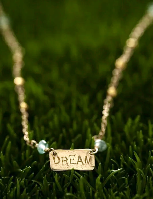 A beautiful piece of jewelry is even more beautiful when it's personalized.  Your choice of an inspiring word or name of a loved one will be hand stamped on a tag of your choice of gold-filled or silver,  accented with semi-precious stones that come in  a variety of colors.  Please inquire if there is a particular stone or color you are interested in.