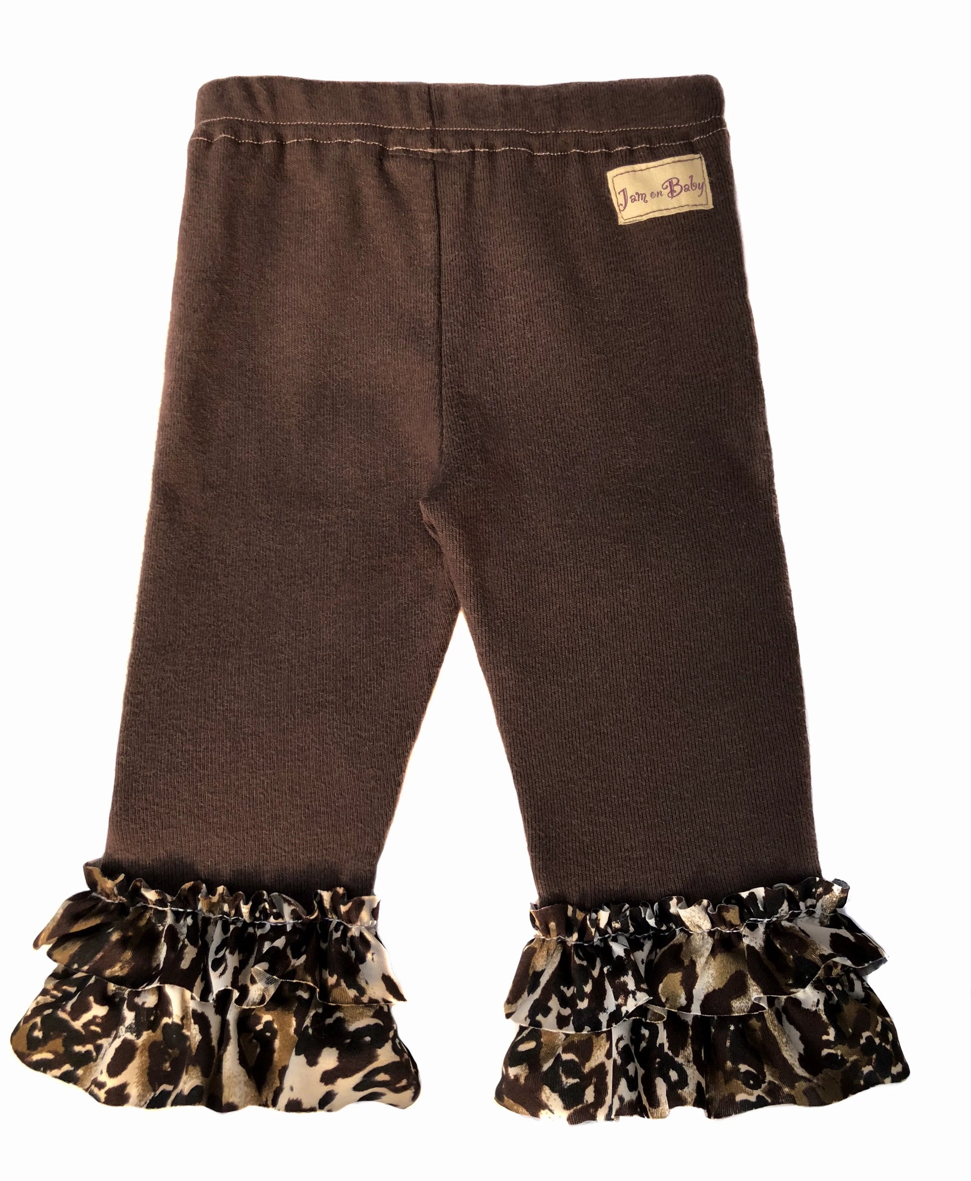 Most popular... our soft, sustainable combed cotton, rib knit legging with fully lined padded knee design. Leopard print ruffle trim in Lycra.  Pair with reversible leopard cuddle vest to complete the look.